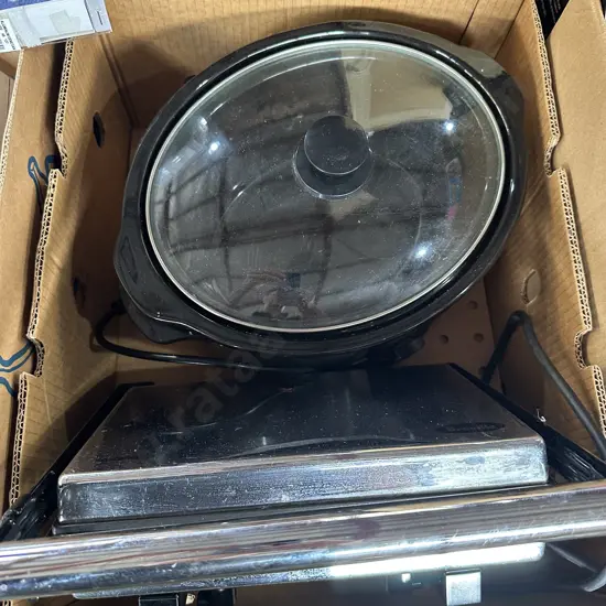 Slow cooker and average sandwich press.