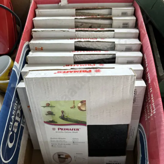 Box of eight Granite corner shelves.