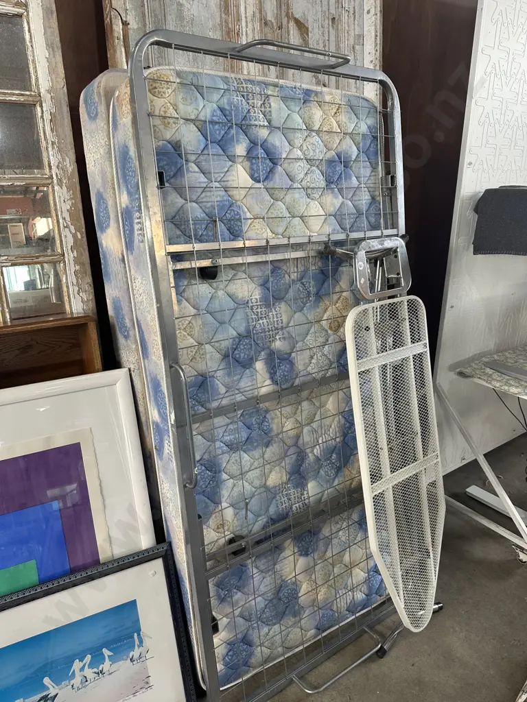 Average single bed plus trundle and ironing board frame. Image 1++