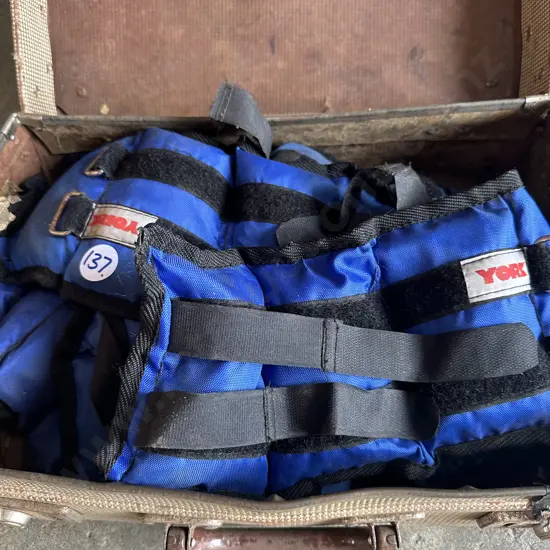 Case of weight belts plus two boxes of cups.