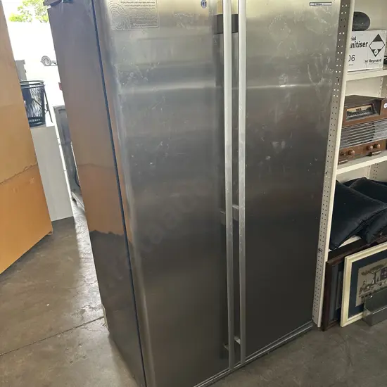 Fridge/freezer stainless steel.