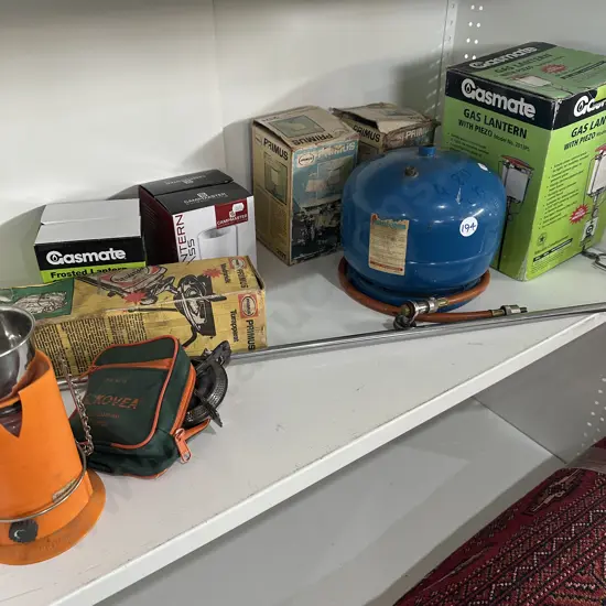 shelf lot of camping gear