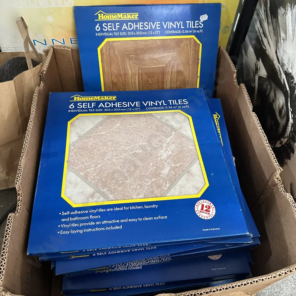 Box full of Self adhesive Vinyl tiles. Image 1++